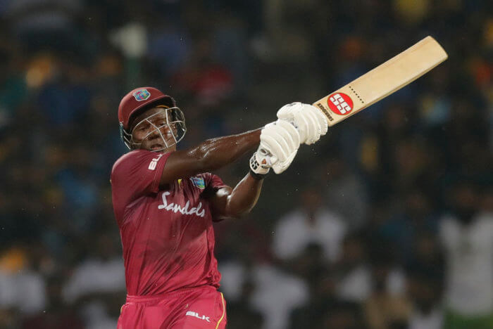 West Indies' batsman Rovman Powell plays a shot during their second Twenty20 cricket match with Sri Lanka in Pallekele, Sri Lanka, Friday, March 6, 2020.
