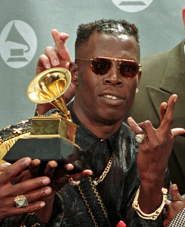 SHABBA RANKS WITH HIS GRAMMY AWARD FOR BEST REGGAE ALBUM IN LOS ANGELES.