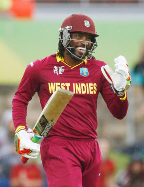 West Indies batsman Chris Gayle celebrates scoring 200 runs, a double century during their World Cup Cricket match against Zimbabwe in Canberra