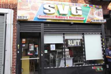Signage at SVG-Caribbean Bakery.  Photo by Nelson A. King