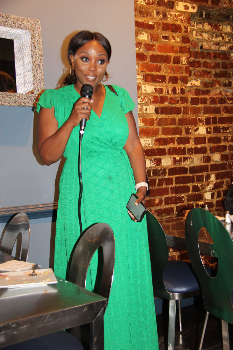 Council Member Farah N. Louis addresses reception.  Photo by Nelson A. King