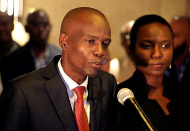 FILE PHOTO: Jovenel Moise addresses the media next to his wife Martine after winning Haiti’s 2016 presidential election
