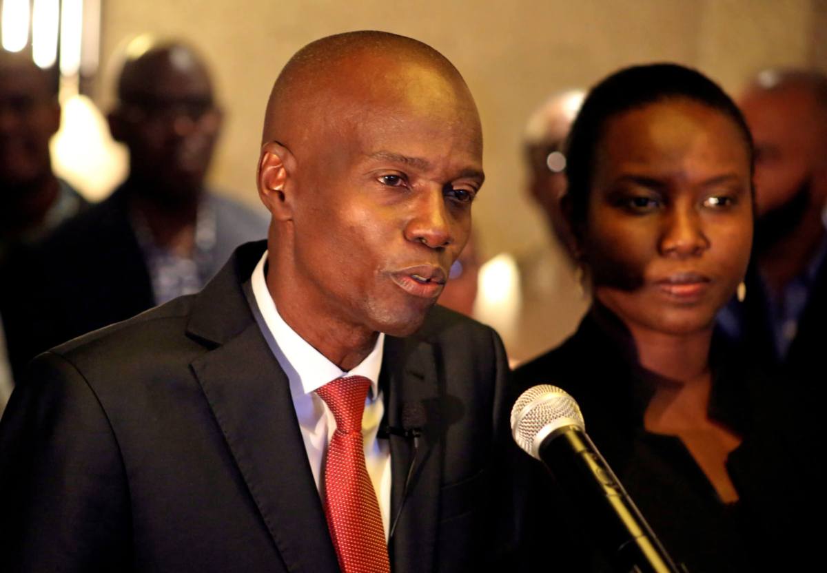 Jovenel Moise addresses the media next to his wife Martine after winning the 2016 presidential election, in Port-au-Prince, Haiti. Picture taken Nov. 28, 2016.