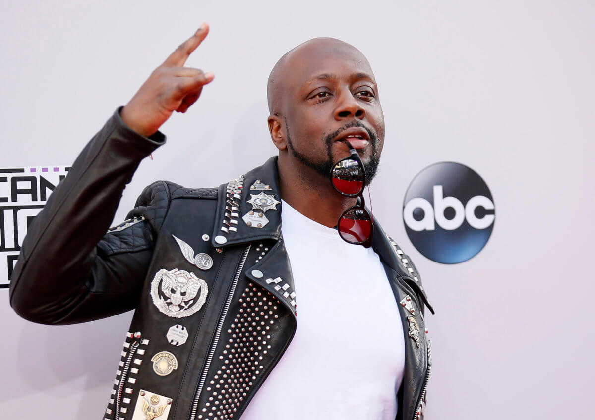 Wyclef Jean arrives at the 42nd American Music Awards in Los Angeles