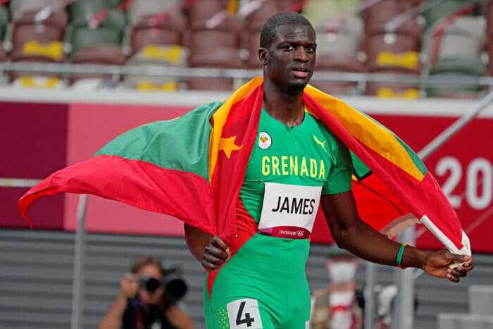Grenada's Kirani James celebrates winning the bronze medal in the men's 400m final during the Tokyo 2020 Olympic Summer Games at Olympic Stadium on Thursday, Aug. 5, 2021 in Tokyo, Japan. 