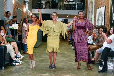 Models with Designer Michi (Center).    Elegance In Focus Magazine