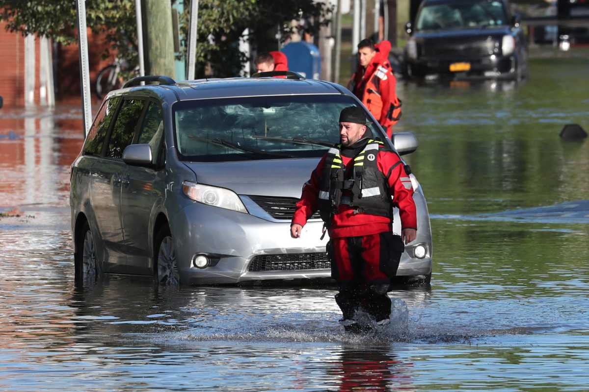 First responders perform rescues of local residents after flooding from the remnants of Tropical Storm Ida in Mamaroneck, New York