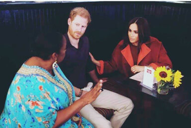Melba Wilson with Prince Harry and Meghan.