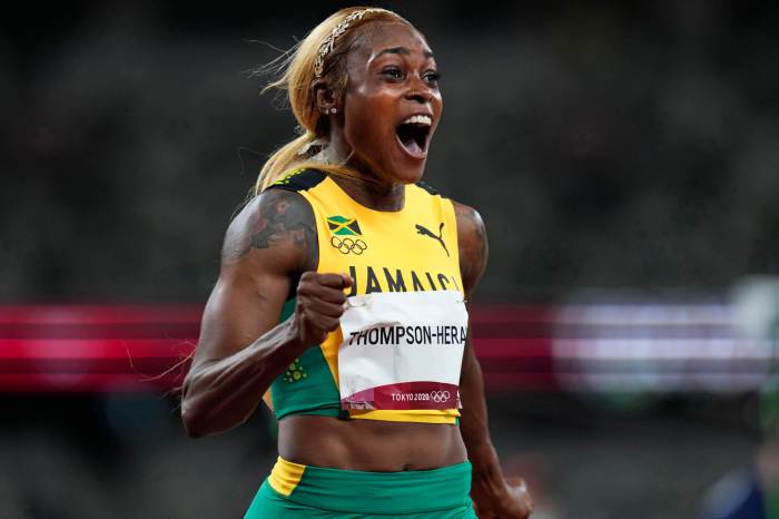 Elaine Thompson-Herah, of Jamaica, wins the women's 100-meter final at the 2020 Summer Olympics, Saturday, July 31, 2021, in Tokyo.