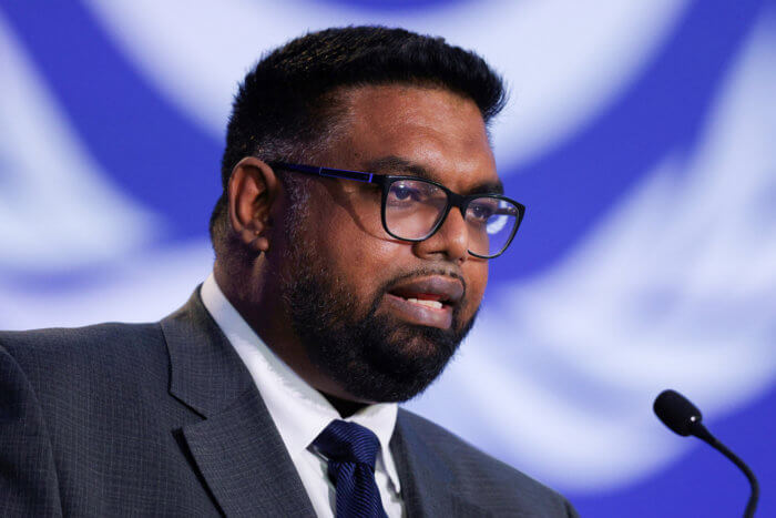 Guyana's President Mohamed Irfaan Ali speaks during the UN Climate Change Conference (COP26) in Glasgow, Scotland, Britain, Nov. 2, 2021.