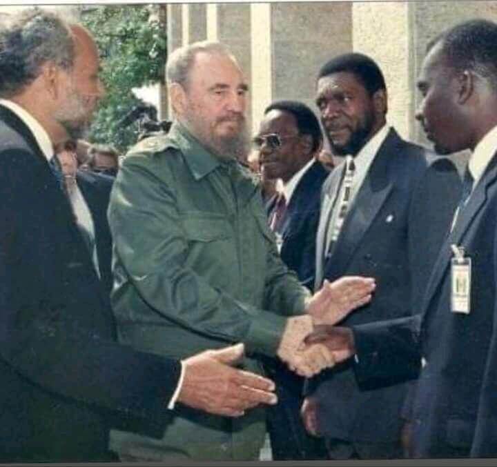 Bernard Wylllie, seconed from right, with former Cuban President Fidel Castro, center, and Sir James F. Mitchell