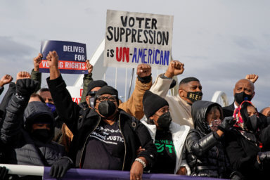 U.S. civil rights activists hold a Peace Walk on the Frederick Douglass Memorial Bridge, in Washington