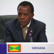 Grenada's Prime Minister Keith Mitchell listens during a news conference to mark the end of the Commonwealth Heads of Government Meeting at Marlborough House in London, Britain, April 20, 2018. Recently the prime minister was one of the signatories to the intra-CARICOM phone roaming charges declaration with the Digicel Group and Cable & Wireless Communications.