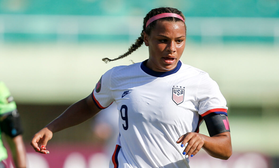 Michelle Cooper wins Best Player Award.  CONCACAF