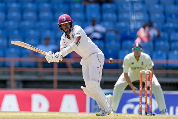 West Indies' captain Kraigg Brathwaite hits a four during day four of the third Test cricket match against England at the National Cricket Stadium in St. George, Grenada, Sunday, March 27, 2022.
