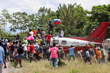 Protesters burn plane belonging to U.S. missionary group, in Les Cayes