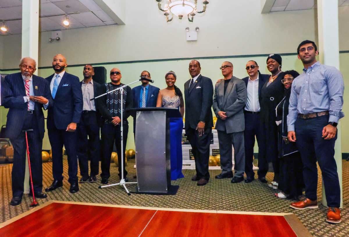 Dr. Simone-Marie L. Meeks (center) with honorees. Photo by Adrian Childress