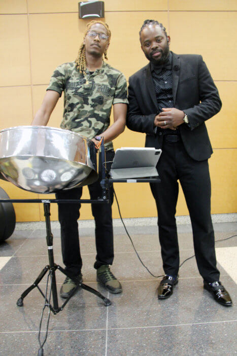 Trinidadian pannist Jahlani Roberts, left, with Grenadian gospel singer, Ijeal Joseph.