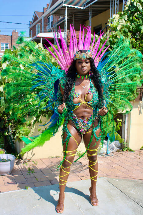 Maxine Magdaleno, band leader of Suga Candy Mas has been designing costumes since age nine. Here she is decked out in a revealing creation from the section Ambrosia by Carib Colors, under the Jungle Fever theme.