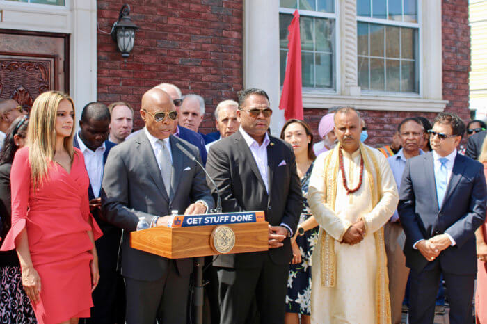 From left, Assemblywoman Jenifer Rajkumar, Mayor of the City of New York, Eric Adams, Romeo Hitlall, Federation of Hindu Mandirs, Founder of the Tulsie Mandir Pandit Lakhram Maharaj, Joe Yussuff, Guyana Consulate, and other elected officials gathered in front of the house of worship, to condemn hate and violence.