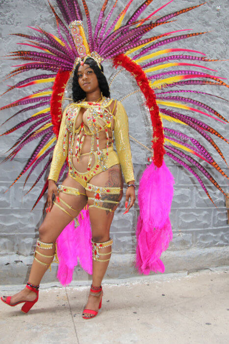 Cassandra Nicholas portrays "Ultra Carnival" (Trinidad). 
