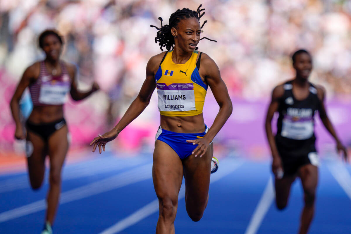 Sada Williams of Barbados reacts as she crosses the finish line to win the women's 400 meters final during the athletics in the Alexander Stadium at the Commonwealth Games in Birmingham, England, Sunday, Aug. 7, 2022.
