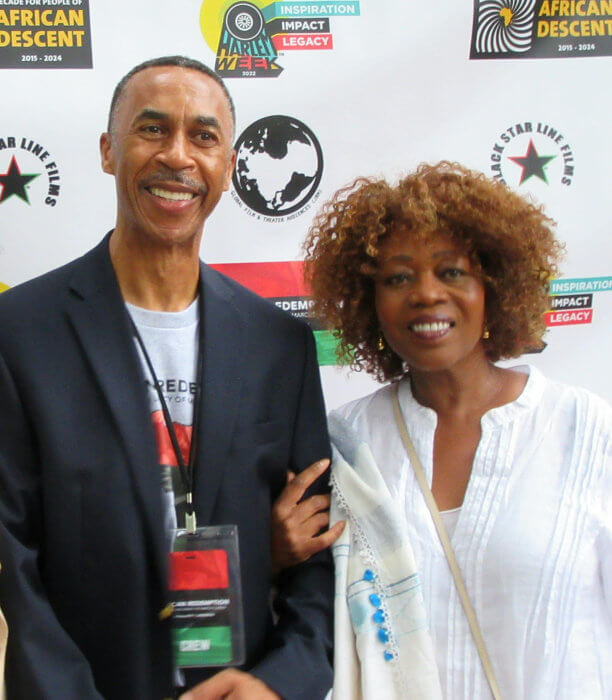 Roy T. Anderson and actress Alfre Woodard at Harlem premiere.