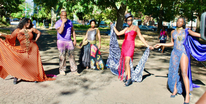 Popular fashion designer, Tyrone Chablis (second from left), with the Showtime Diva models at Von Herbert King Park, during the 17th Annual Lenny Green Family Day.