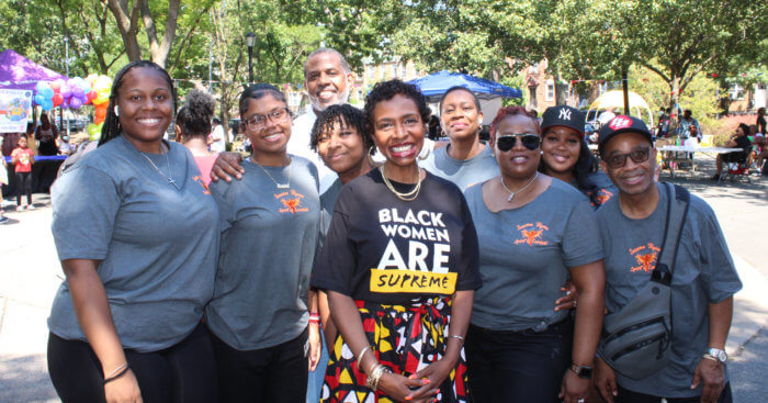 Sen. Kevin Parker, back row, and Congresswoman Yvette D. Clarke front row, with members of Sesame Flyers organization, one of the sponsors of the Annual Harvest Fest.