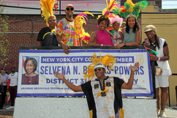 City Council Member Selvena N. Brooks-Powers' float, with Sen. James Sanders, Jr. in foreground.