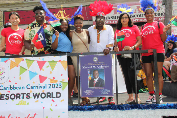 Assembly Member Kaleel M. Anderson's (fifth from left) float with Dep. Brooklyn Borough President Diana Richardson (fourth from left). 