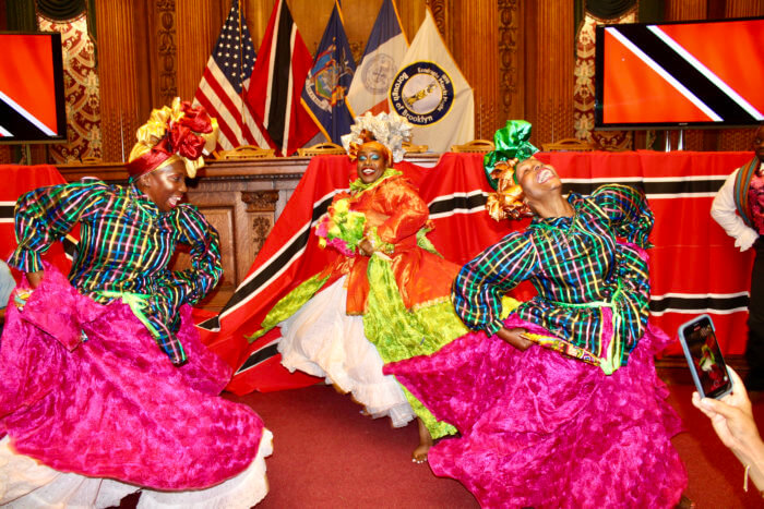 Dancers of the Something Positive Company during a dance sequence to close the curtains on an evening of excellence celebrating T&T's 60th Anniversary of Independence at Borough Hall.  