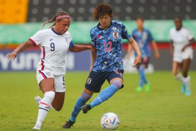 Michelle Cooper #9 of United States competes for the ball with Haruna Tabata #12 of Japan during the match between United States vs Japan as part of the FIFA U-20 Women's World Cup Costa Rica 2022 held at the Alejandro Morera Soto stadium in Alajuela, Costa Rica.