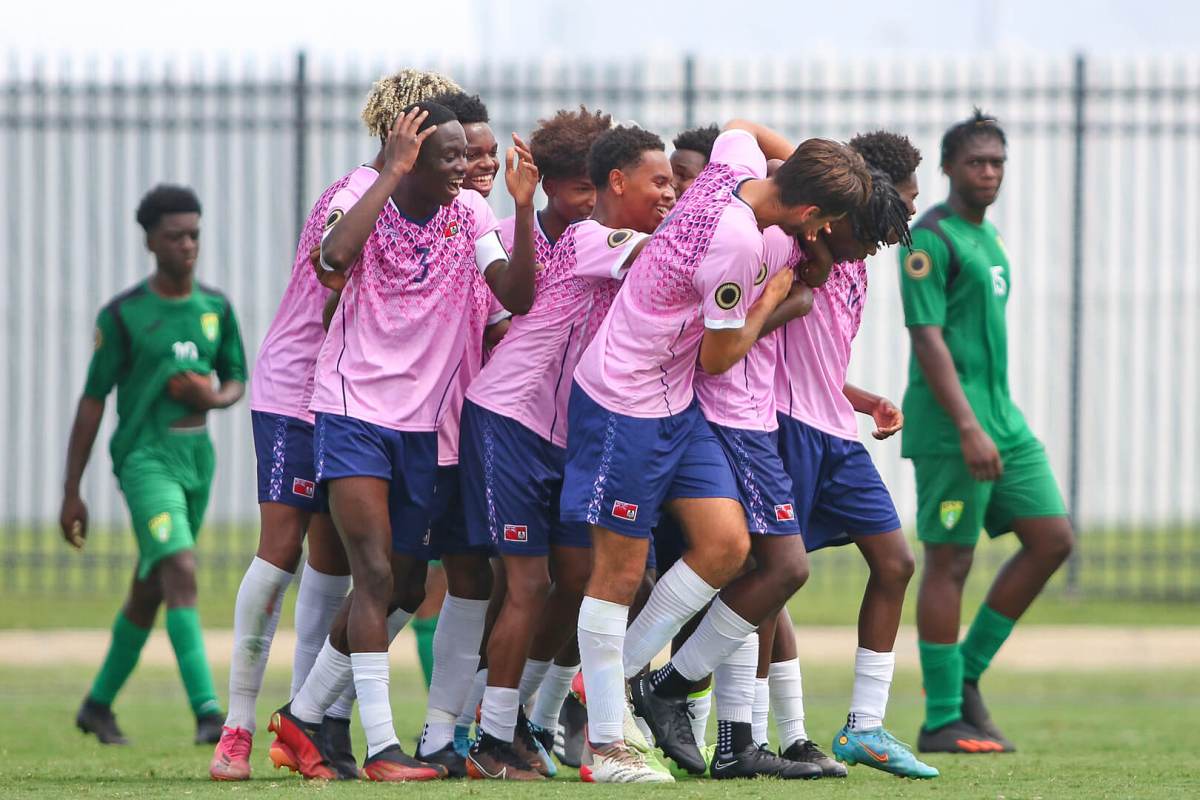 Bermuda celebrates one of its four goals in the match against the British Virgin Islands.