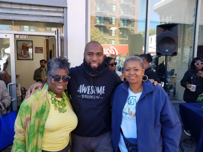 Brian A. Cunningham pose with attendees during the re-opening of his new district office.