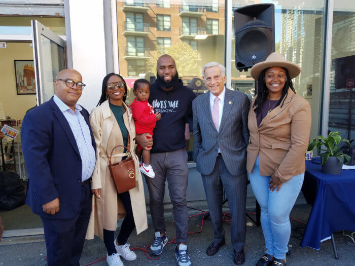 Assembly Members Chantel Jackson, David I. Weprin, Edward Gibbs and Ms. Stephanie Cunningham, pose during the office re-opening with Brian A. Cunningham in the middle.