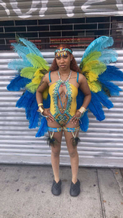 Masquerader Nakiyah wears an "Abracadabra," costume, which uncovers skin and implies erotic desire and seduction.