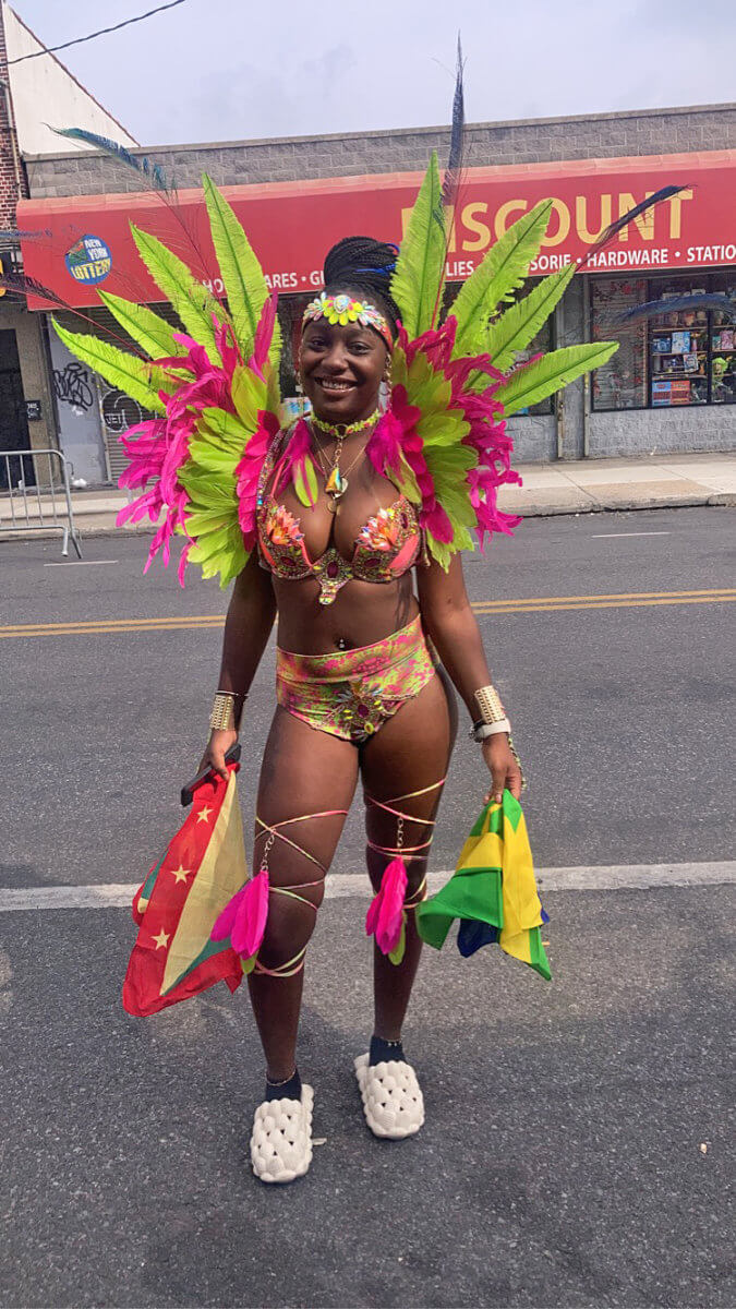 Masquerader Keshawna parades the "Monday Magic" attire.