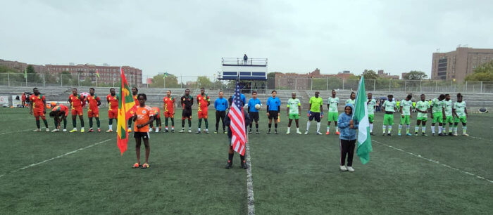 Team Grenada and Team Nigeria before the start of the Brooklyn-based Caribbean Premier League Soccer (CPLS) Championship Cup at the Old Boys and Girls High School Grounds on Maple Street in Brooklyn.