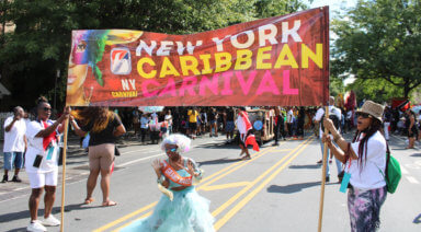 Eight-year-old Savha Williams puts on an exciting performance as the Grand Marshall at the Junior Carnival Day Parade in Crown Heights.