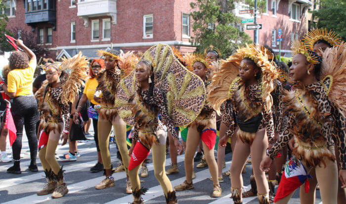 African Warriors masquerading along St. John's place at the return of the Junior Carnival Day Parade in Crown Heights on Saturday, Aug. 3, 2022.