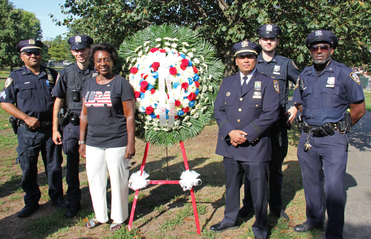 Dr. Judith Newton, third from left, with officers from the 69th Precinct.