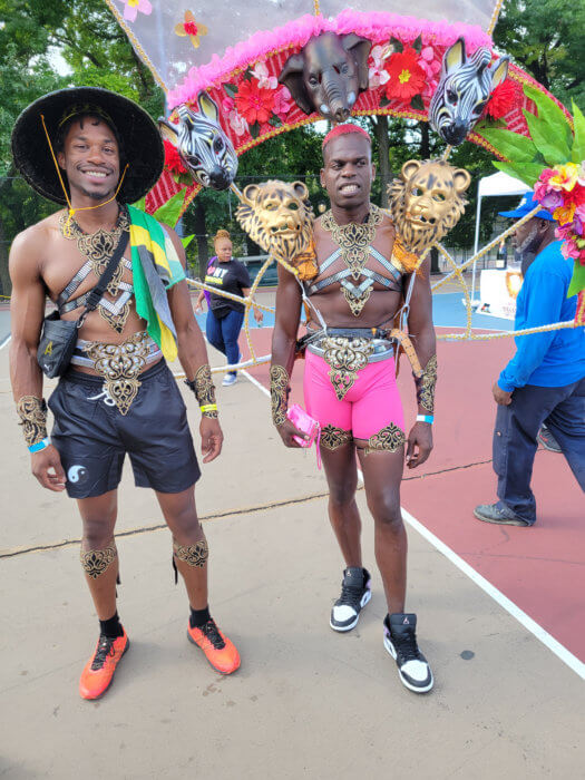 Lamond Joseph, Trinidad, right, portrays "Zoo Keeper" with Antoine International, flanked by Jamaican American Hercules Reid, a former candidate for the 58th Assembly District in Brooklyn. 