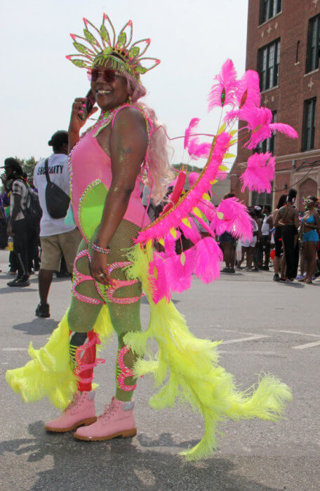 Trinidadian Stacey Henry plays with Sesame Flyers. 