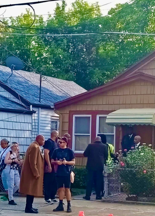 Award-winning actor Forest Whitaker second from left, (wearing winter coat) starring as Bumpy Johnson, in the critically acclaimed movie, "The Godfather of Harlem," outside the home of Trinidadian-born Nestor Jasper in Canarsie, Brooklyn. 