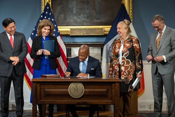 Mayor Eric Adams signs two bills to promote broad-based economic recovery In NYC.