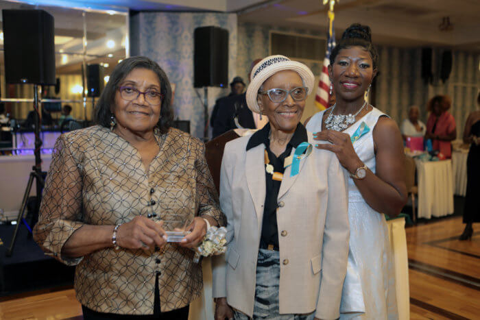 From left: Dr. Pamella Hosang (honoree), Rev. Hyacinth Burgher (presenter), and Dr. Claudette McFarquhar, president.