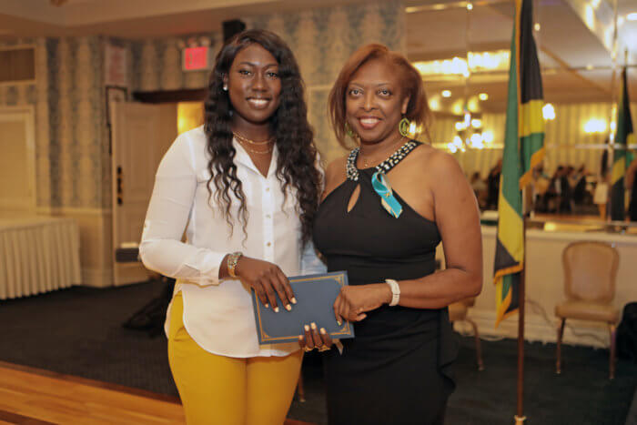 Zonika Tracey, scholarship recipient (left), and Marlene Lofter-Dinham (presenter).