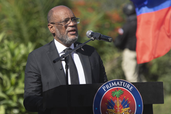 FILE - Haitian Prime Minister Ariel Henry speaks during a ceremony in memory of slain Haitian President Jovenel Moise at the National Pantheon Museum in Port-au-Prince, Haiti, July 7, 2022. Henry has dismissed Haiti’s justice minister, interior minister and its government commissioner in a fresh round of political upheaval, according to documents that The Associated Press obtained on Monday, Nov. 14, 2022.