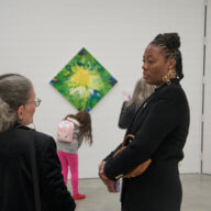 Afesha Wilkins, right, in conversation at OSMOSIS exhibition.